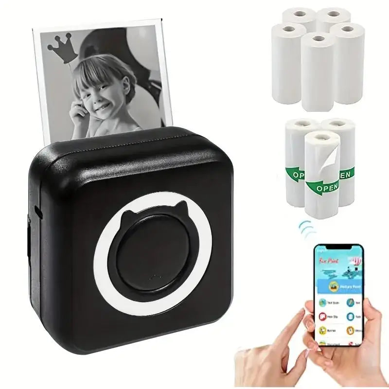 Black photo printer with photo, ink rolls, and smartphone app on a white background