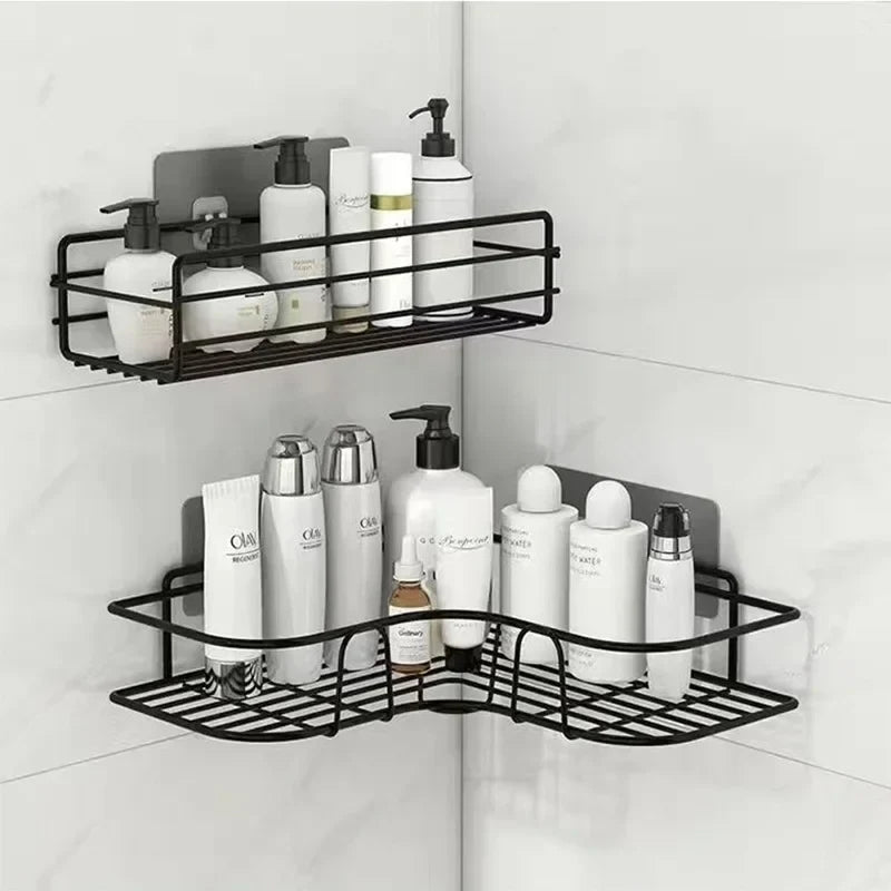 Black corner shower caddy with various bottles on a tiled wall.