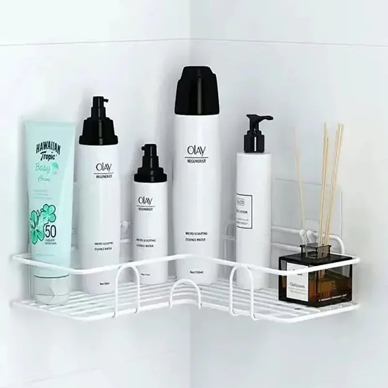 Bathroom shelf with skincare products on a white wall