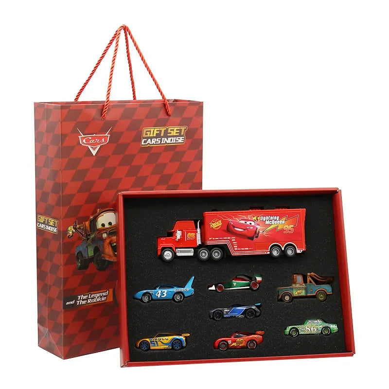 Gift set of toy cars in a red and black checkered box with a matching bag.