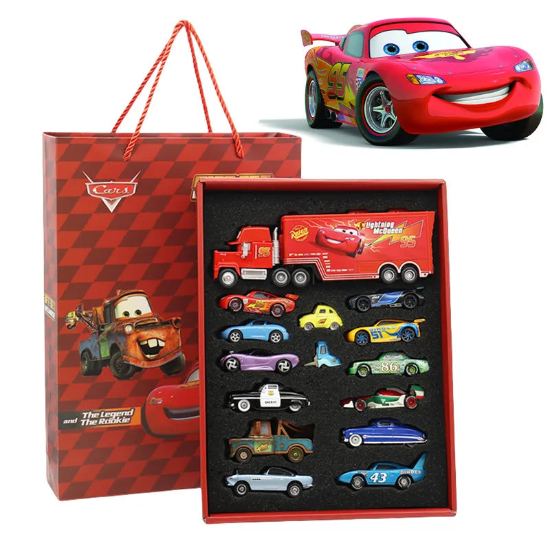 Box of toy cars with a 'Cars' branded gift bag and toy car figure in the background.