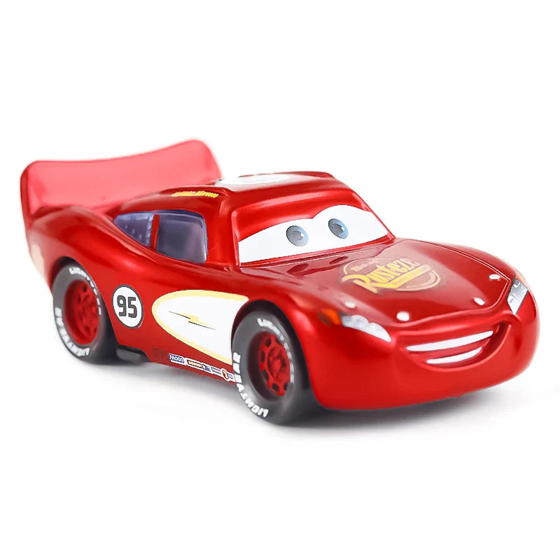 Red toy car with a smiling face on a white background