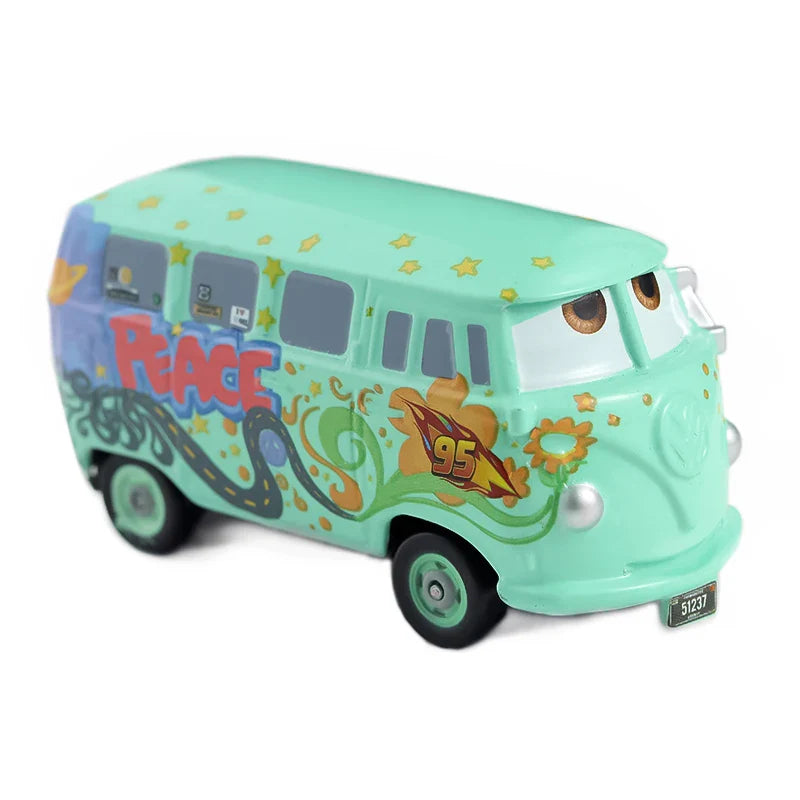Colorful toy van with 'Peace' and other designs on a white background