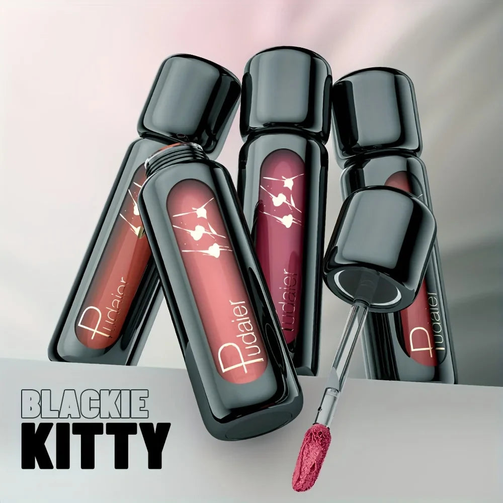 Blackie Kitty lip gloss with applicator on a light background