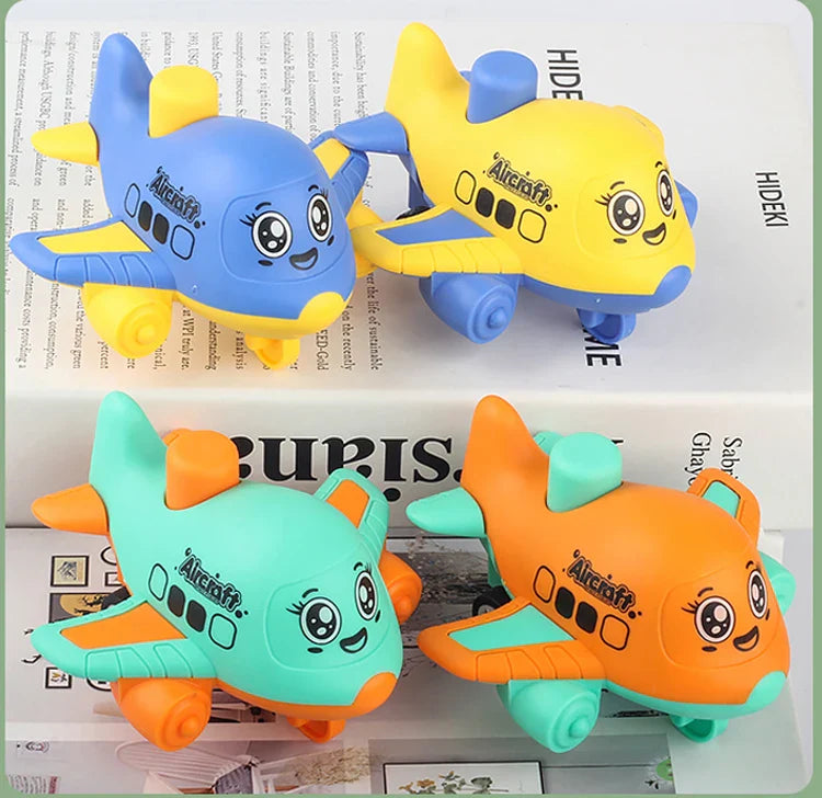 Four colorful airplane toys with cartoon faces on a magazine background