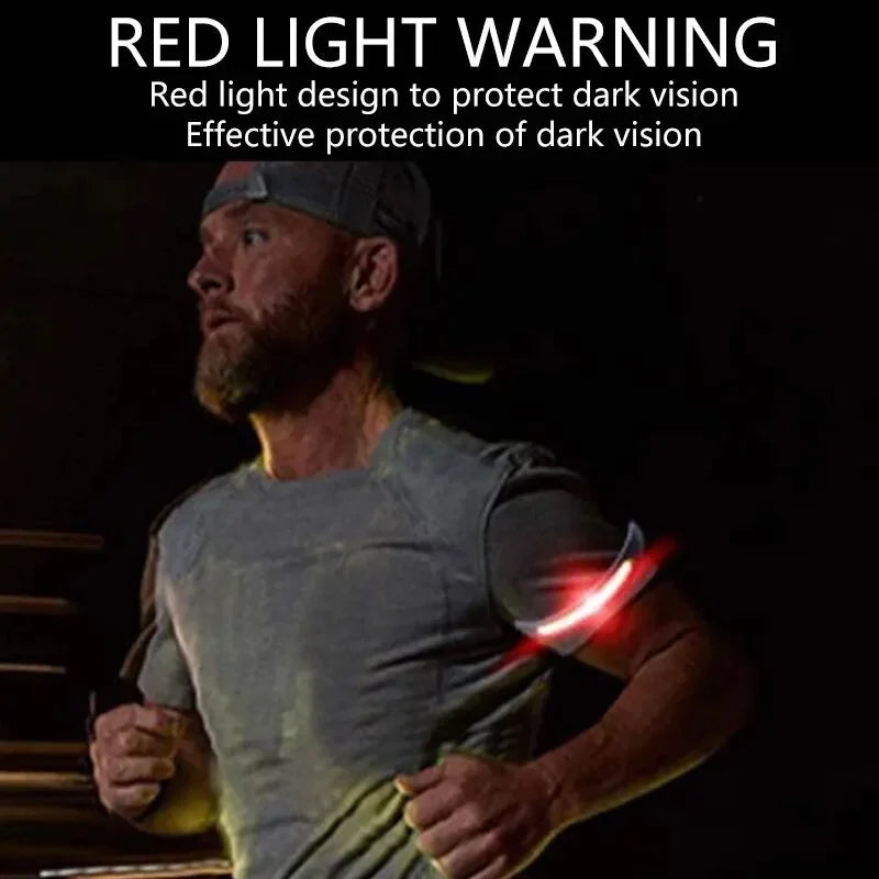 Man wearing a gray shirt with a red light design, text about red light warning and dark vision protection.