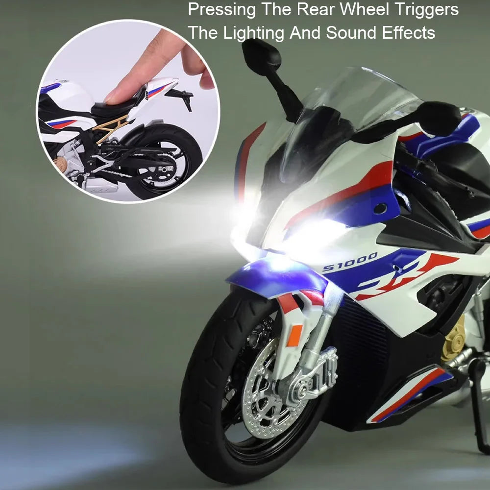 Model motorcycle with lighting and sound effects triggered by pressing the rear wheel, on a gray background.