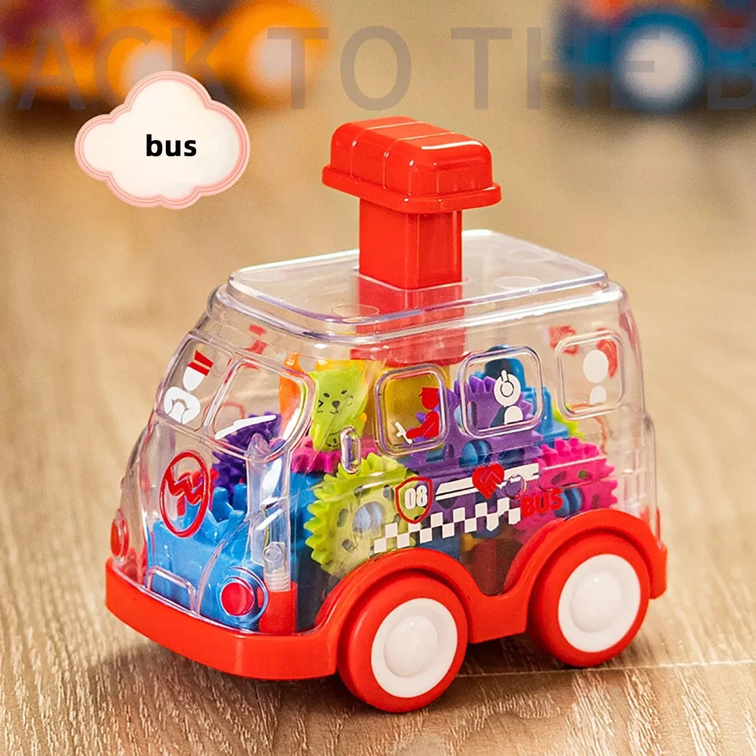 Toy bus with colorful building blocks inside on a wooden surface