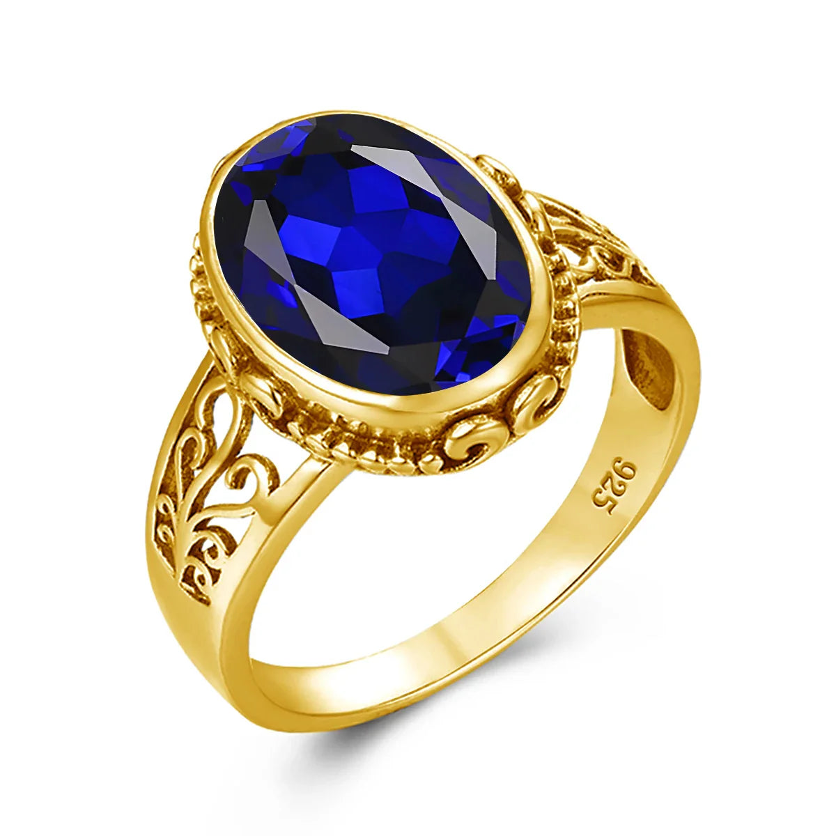 Gold ring with a blue gemstone on a white background
