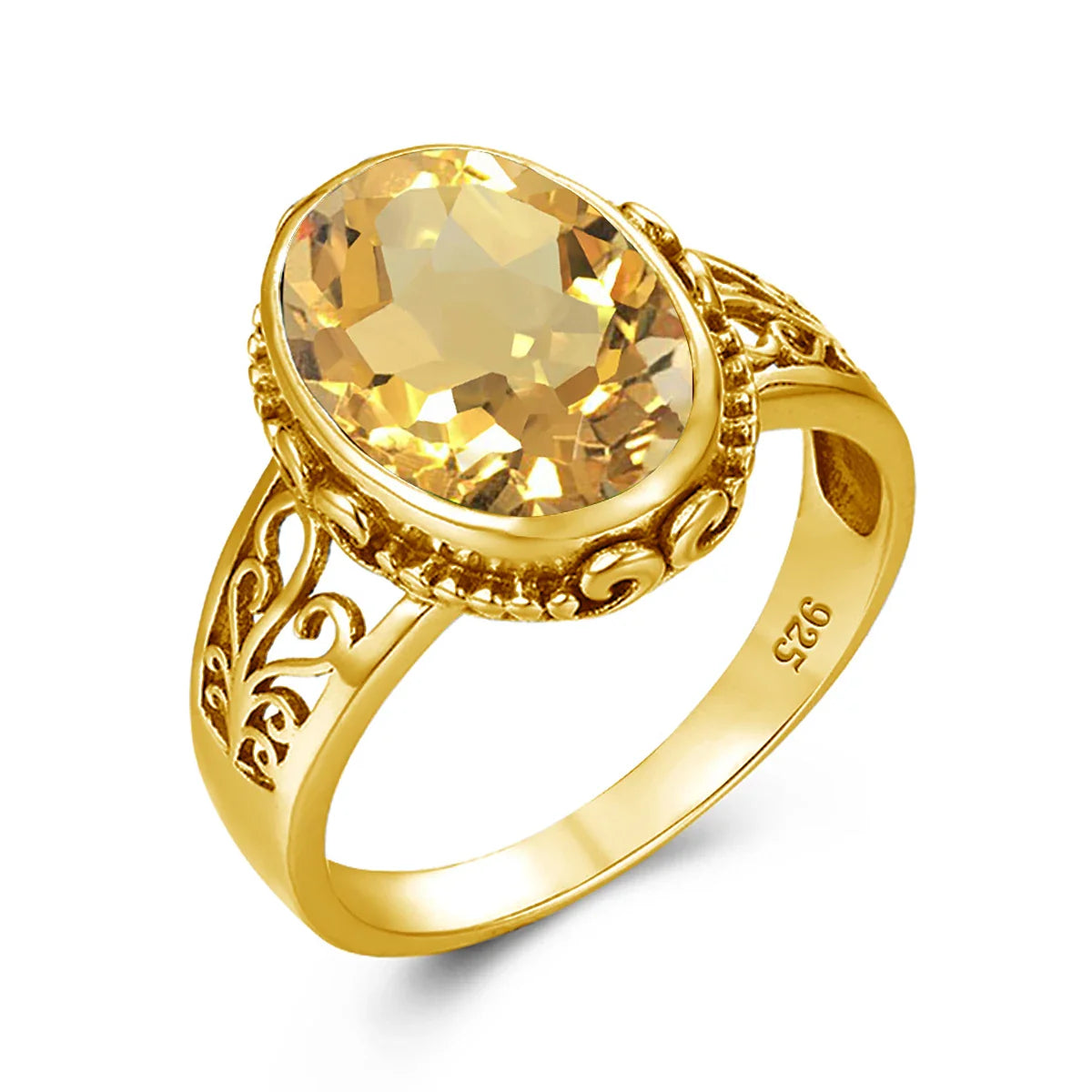 Gold ring with a large yellow gemstone on a white background